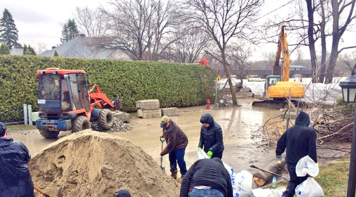 Record-setting floods assail North Shore and surrounding regions Record-setting floods assail North Shore and surrounding regions