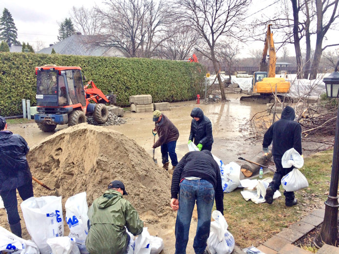Record-setting floods assail North Shore and surrounding regions Record-setting floods assail North Shore and surrounding regions